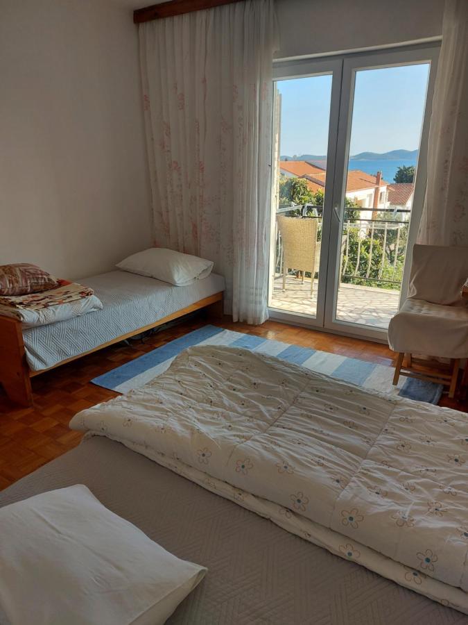Janice L Pakoštane Rum bild